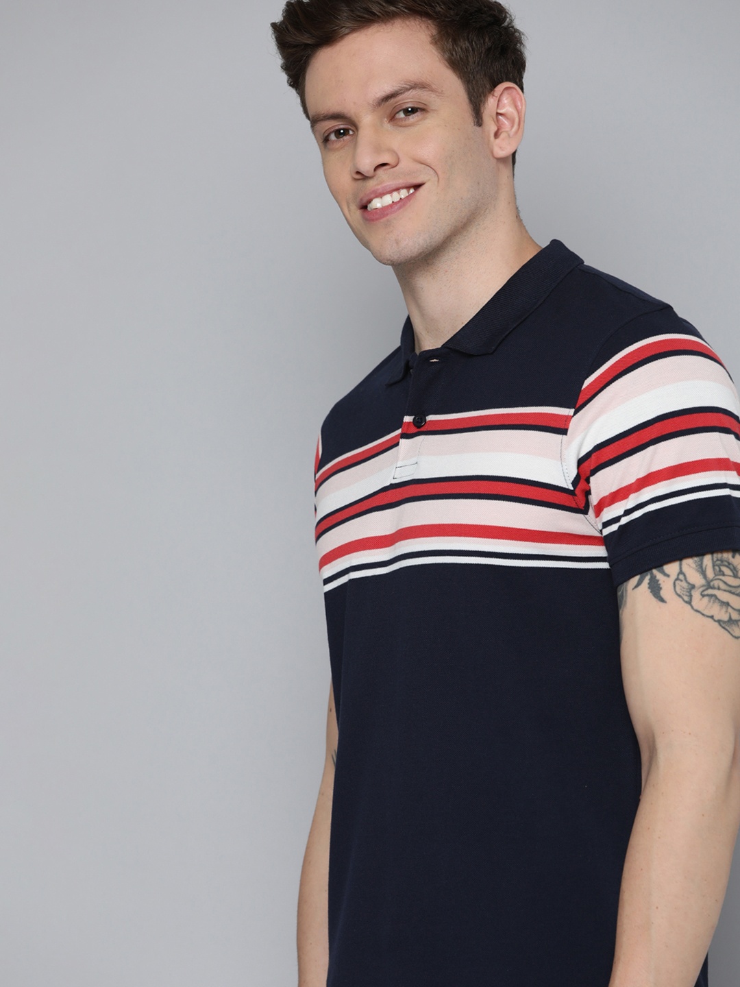 

Mast & Harbour Men Navy Blue & Peach-Coloured Striped Polo Collar T-shirt