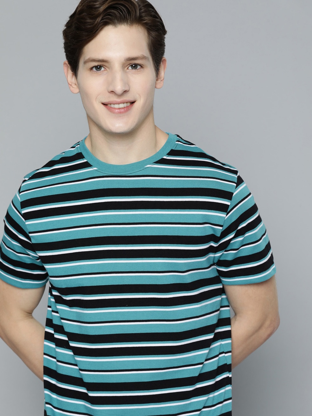 

Mast & Harbour Men Blue & Black Striped T-shirt