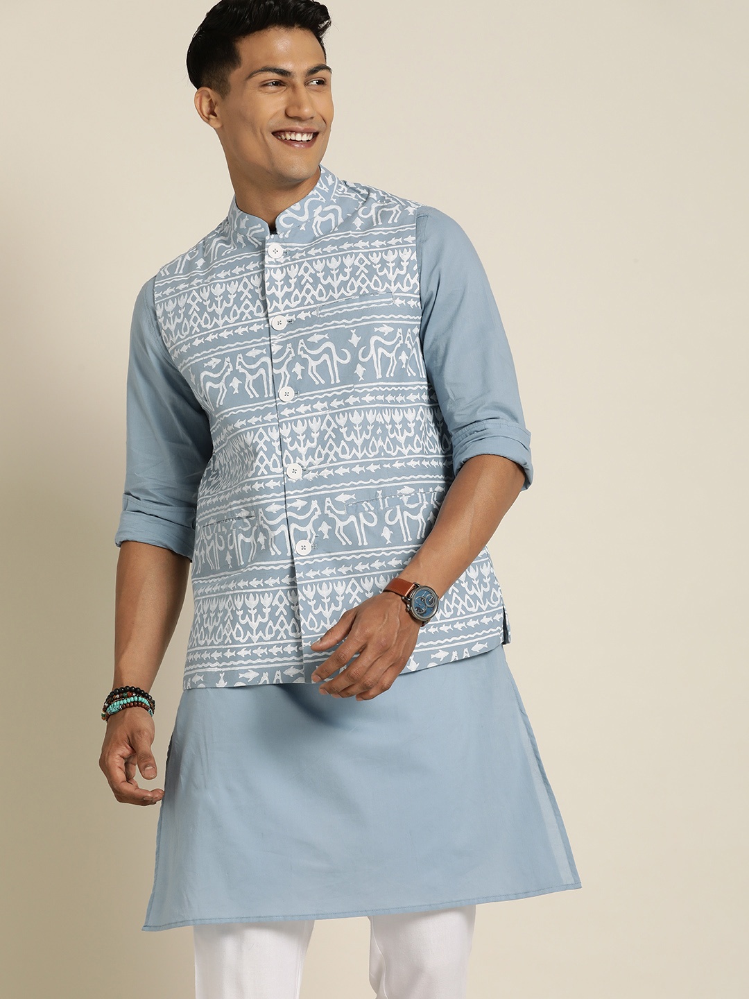 

Taavi Men Blue Bagru Folks Printed Pure Cotton Kurta Set with Nehru Jacket
