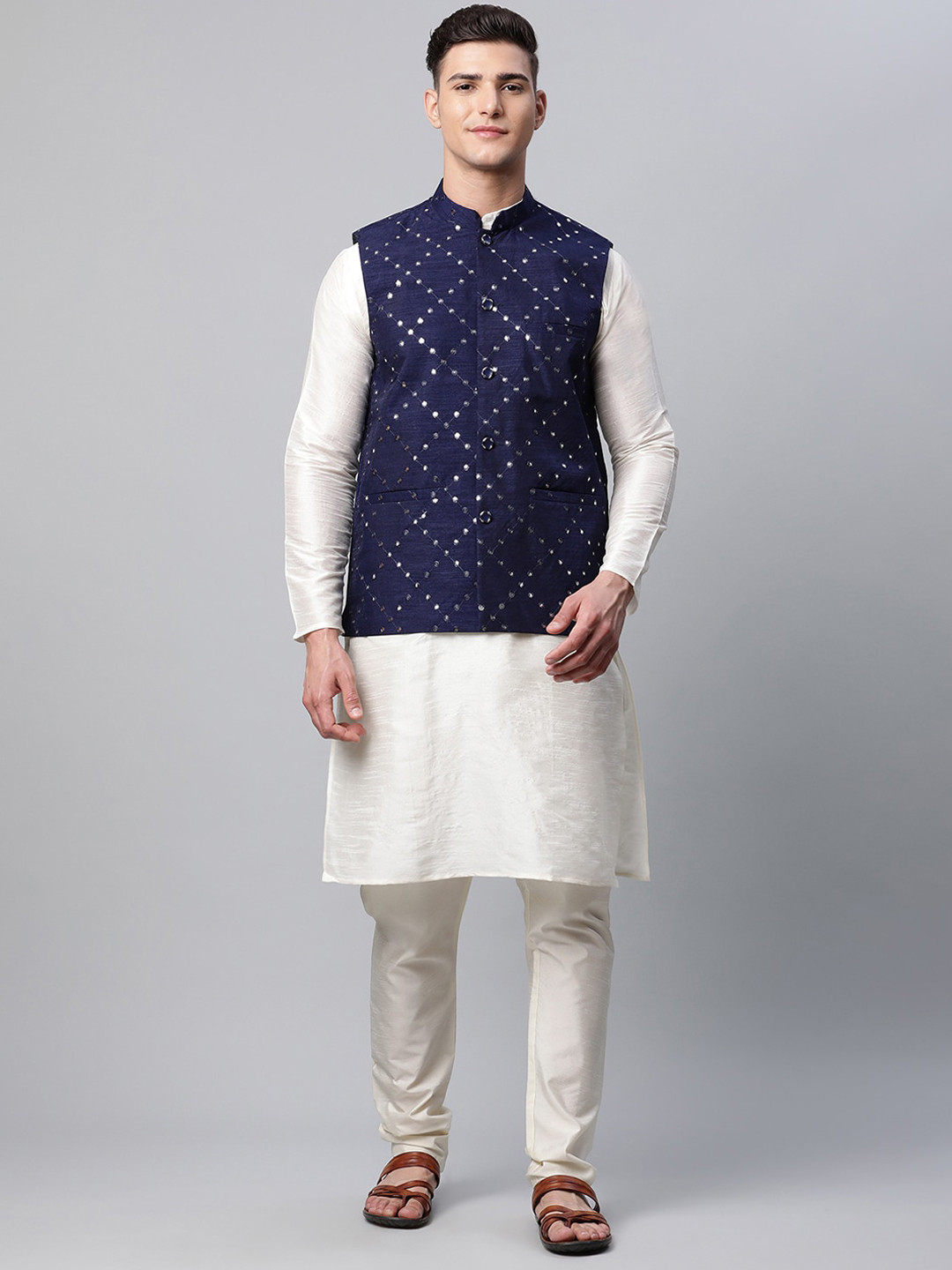 

Jompers Men Navy Blue Mandarin Collar Dupion Silk Straight Kurta Pyjamas & Nehru Jacket