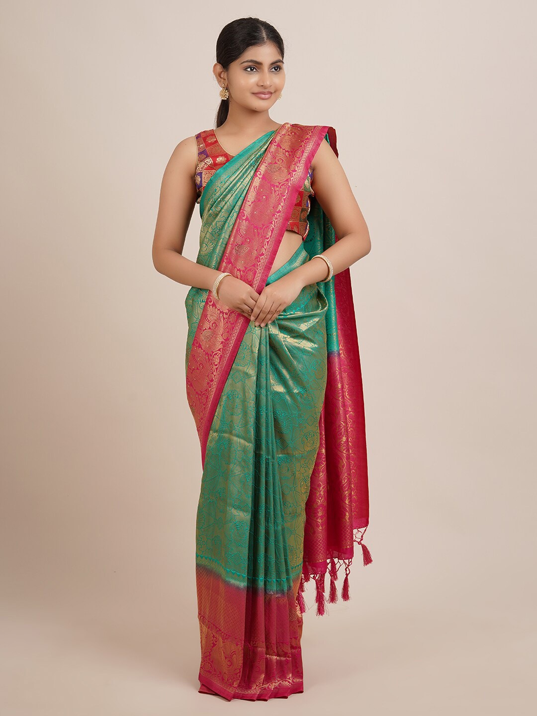 

Pothys Green & Fuchsia Ethnic Motifs Zari Jute Silk Saree