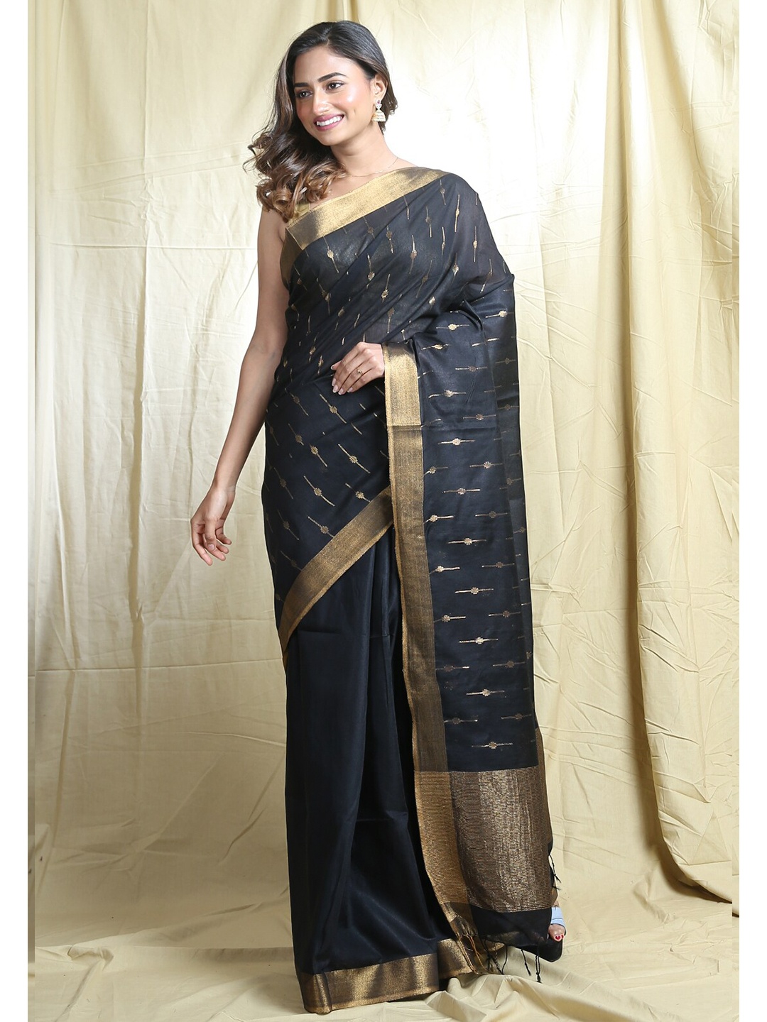

Arhi Black & Golden Zari Geometric Saree