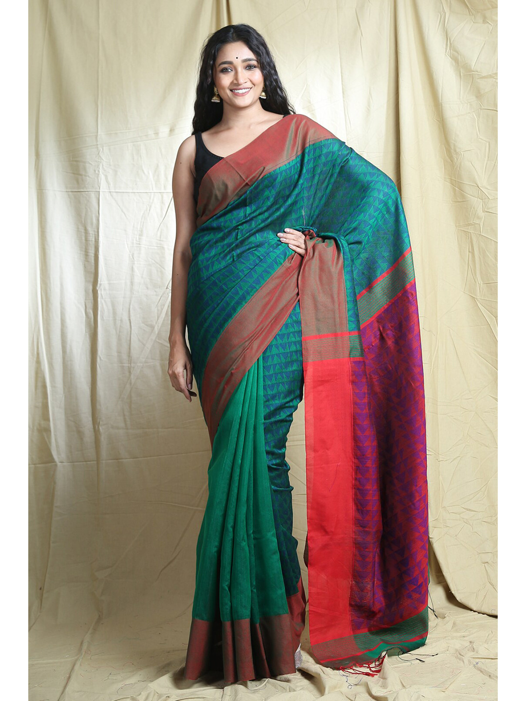 

Arhi Teal & Red Geometric Saree