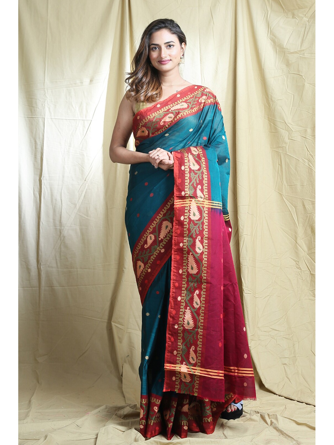 

Arhi Teal & Red Woven Design Zari Saree