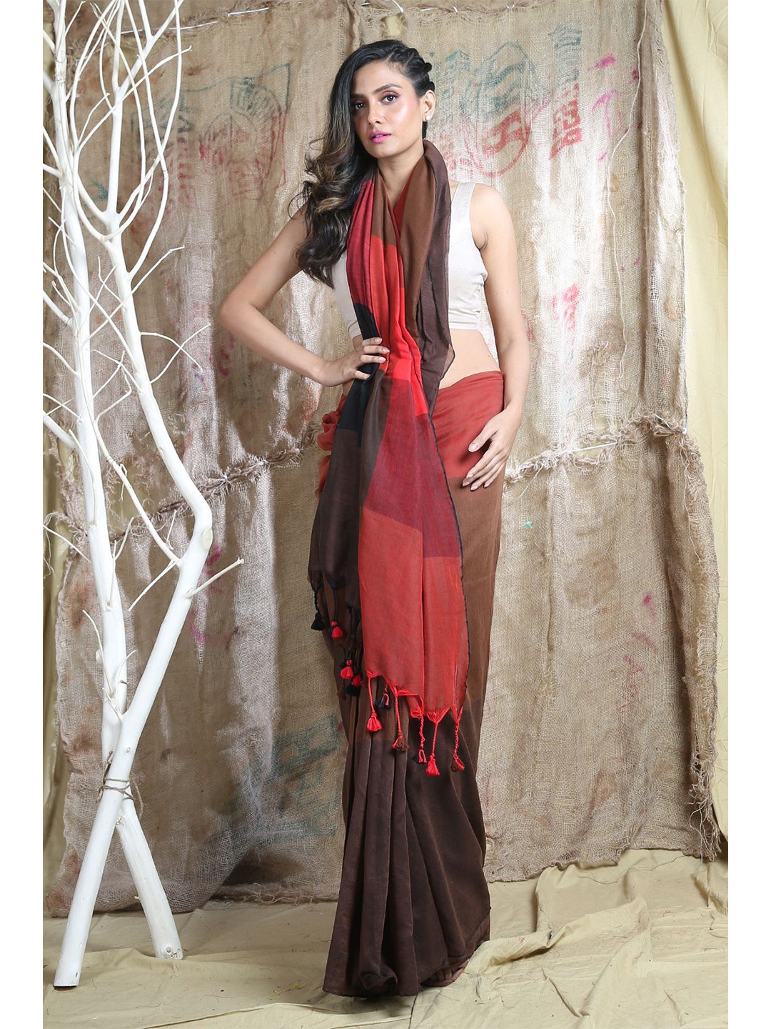 

Arhi Red & Brown Colourblocked Saree