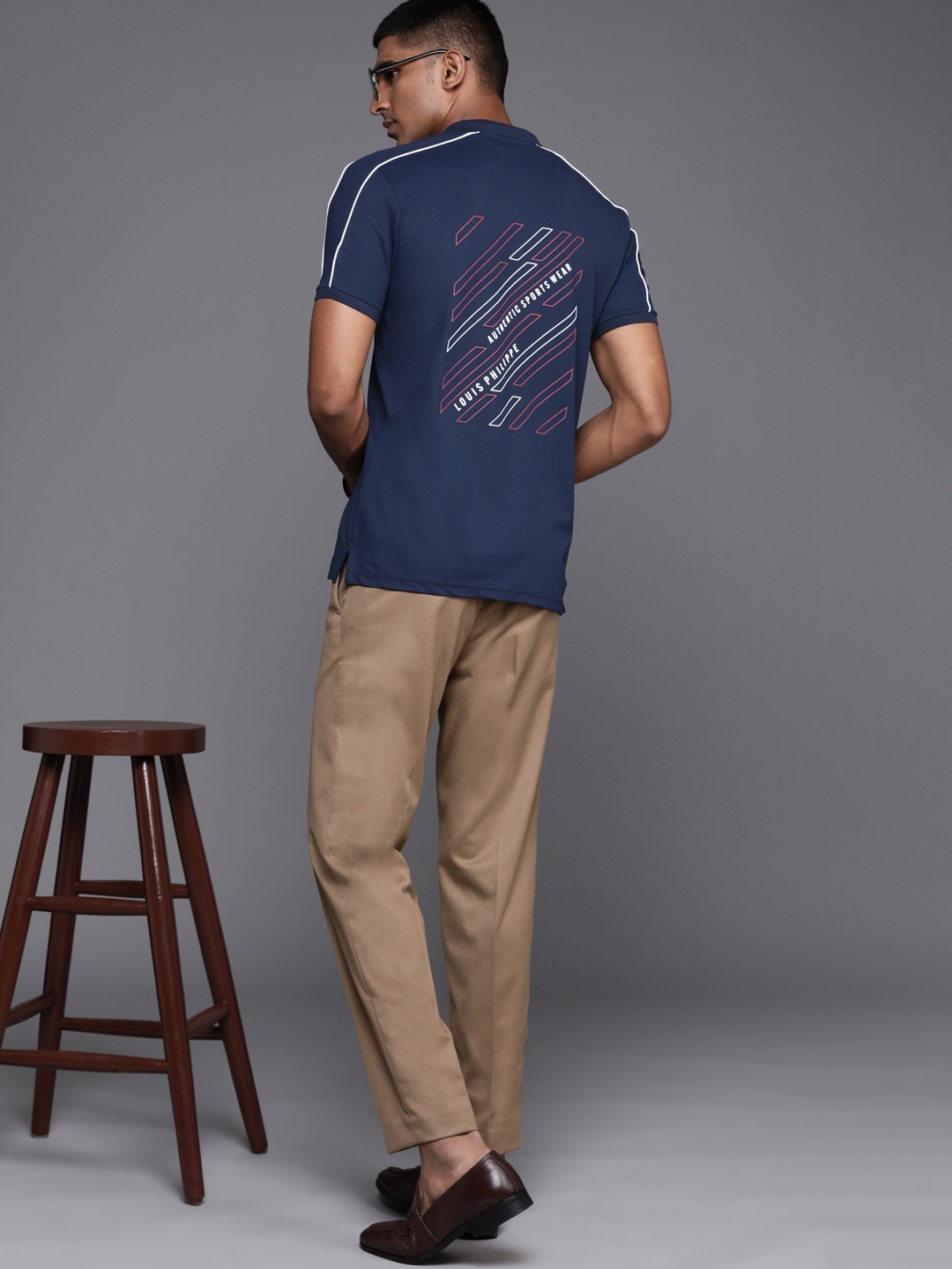 

Louis Philippe Sport Men Navy Blue & White Typography Printed Polo Collar T-shirt