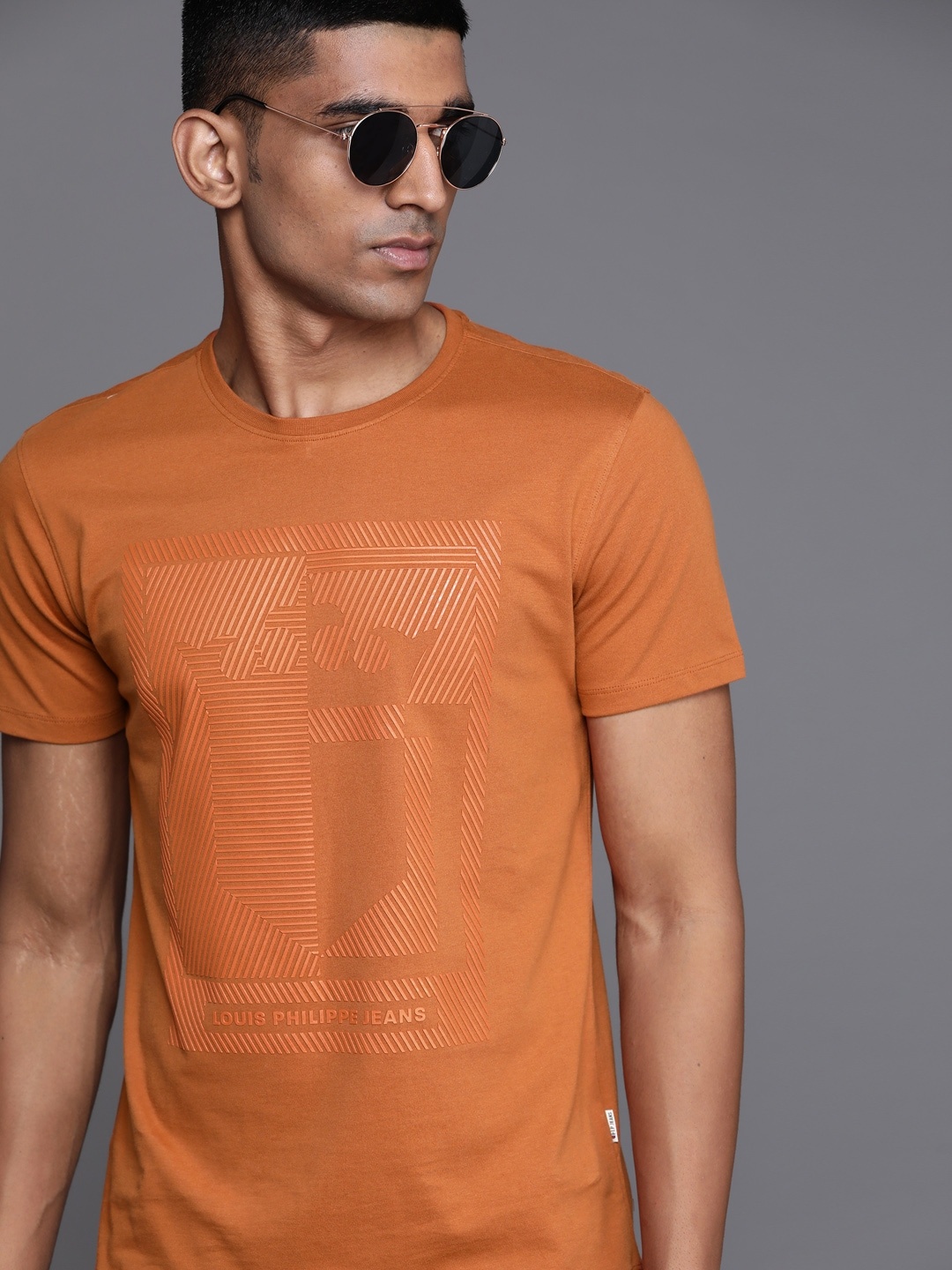 

Louis Philippe Jeans Men Rust Orange Pure Cotton Brand Logo Embossed Printed T-shirt