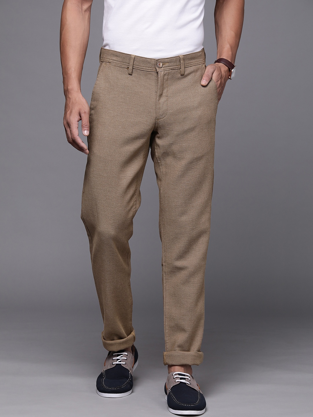 

Louis Philippe Sport Men Brown Self Design Slim Fit Trousers