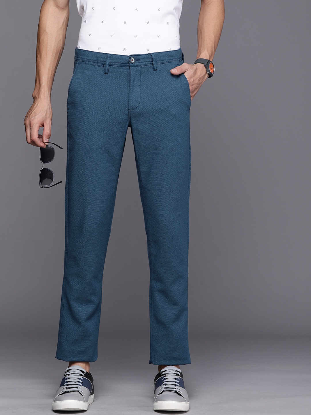 

Louis Philippe Sport Men Teal Blue Textured Slim Fit Trousers