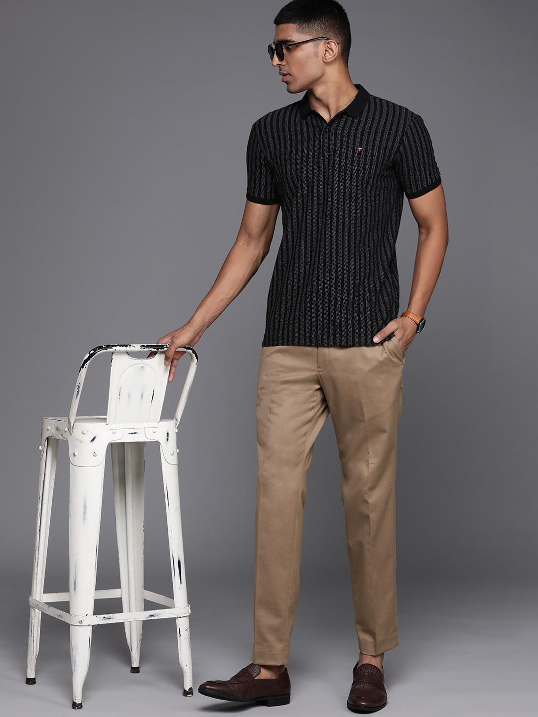 

Louis Philippe Sport Men Black & White Striped Polo Collar T-shirt