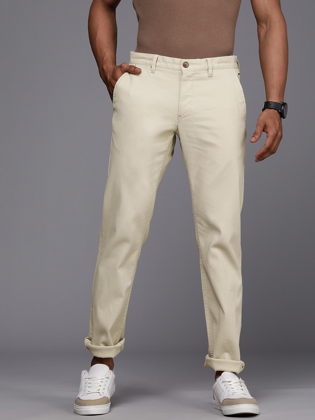 

Louis Philippe Sport Men Beige Textured Slim Fit Low-Rise Trousers
