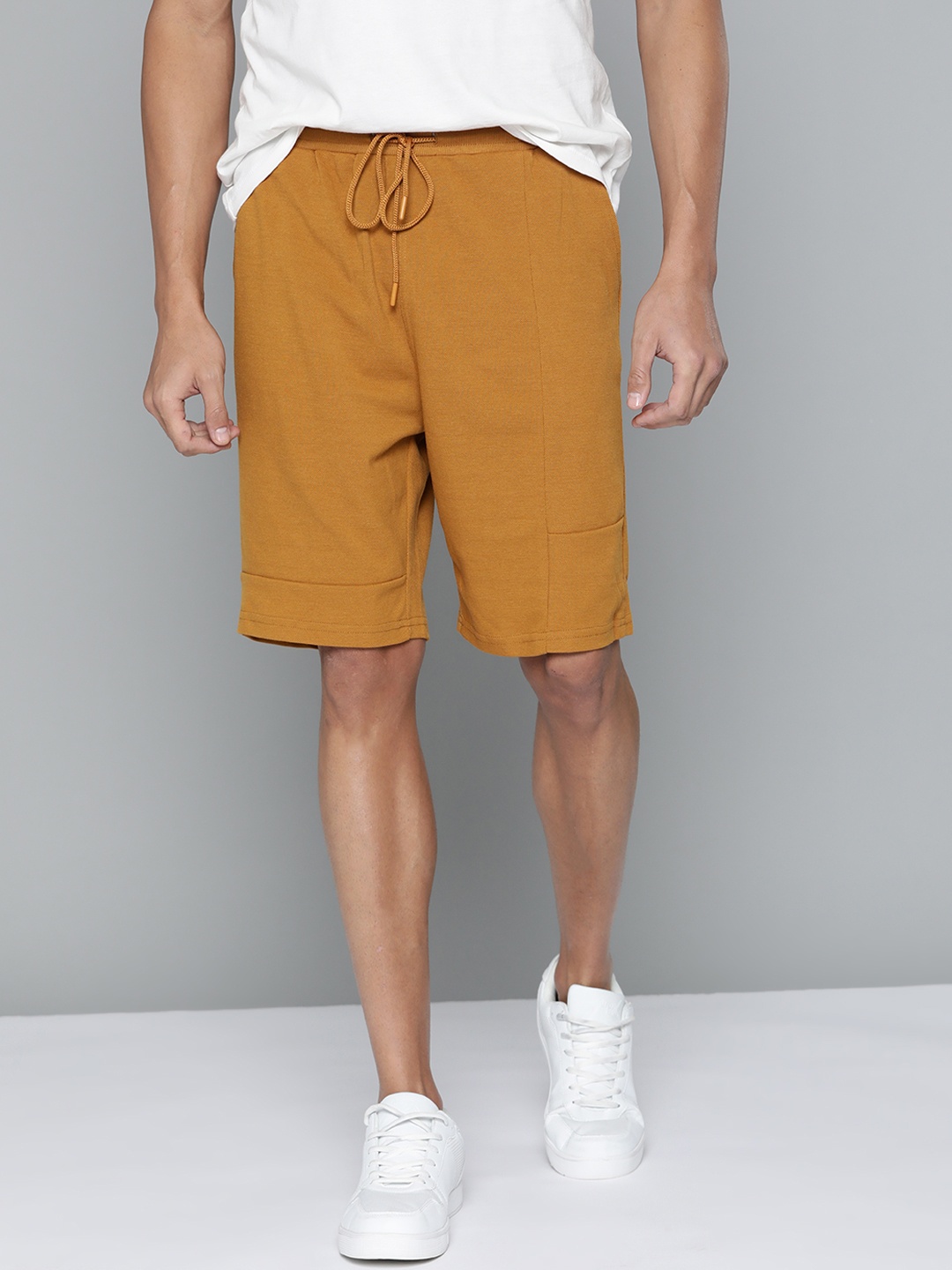 

Mast & Harbour Men Mustard Solid Shorts