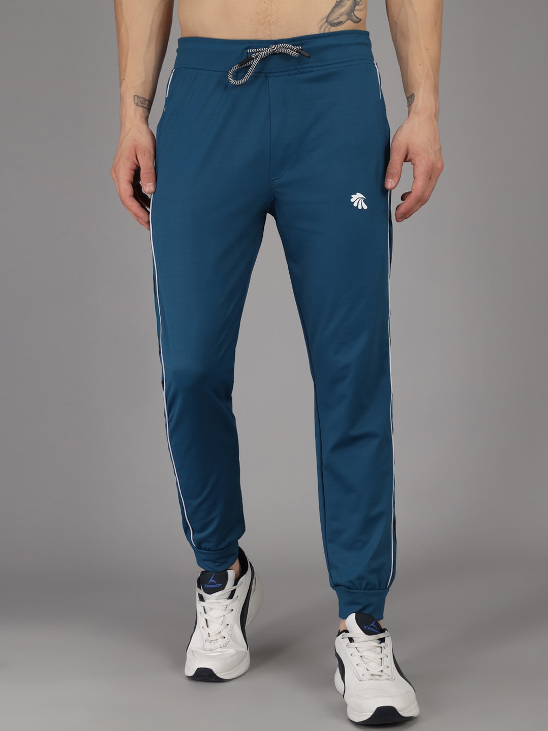 

Gallus Men Teal Blue Solid Training Joggers with Side Printed Detail