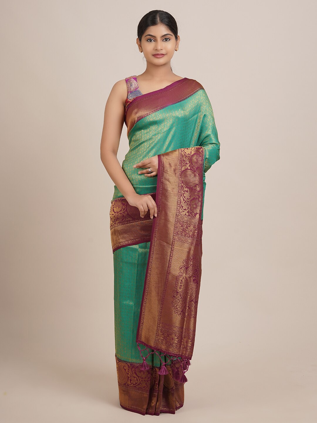 

Pothys Green & Burgundy Woven Design Zari Jute Silk Saree