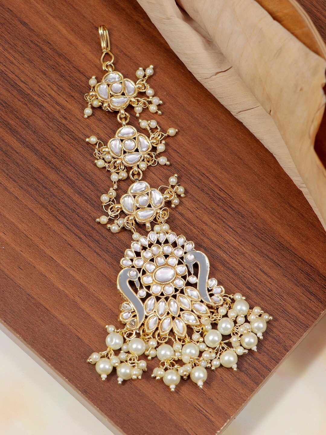 

Crunchy Fashion Gold-Plated White Meenakari Kundan Stone Embedded Maang Tika