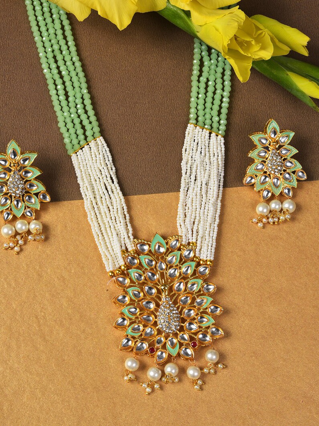 

SOHI Gold-Plated White & Green Stone-Studded & Pearl Beaded Jewellery Set