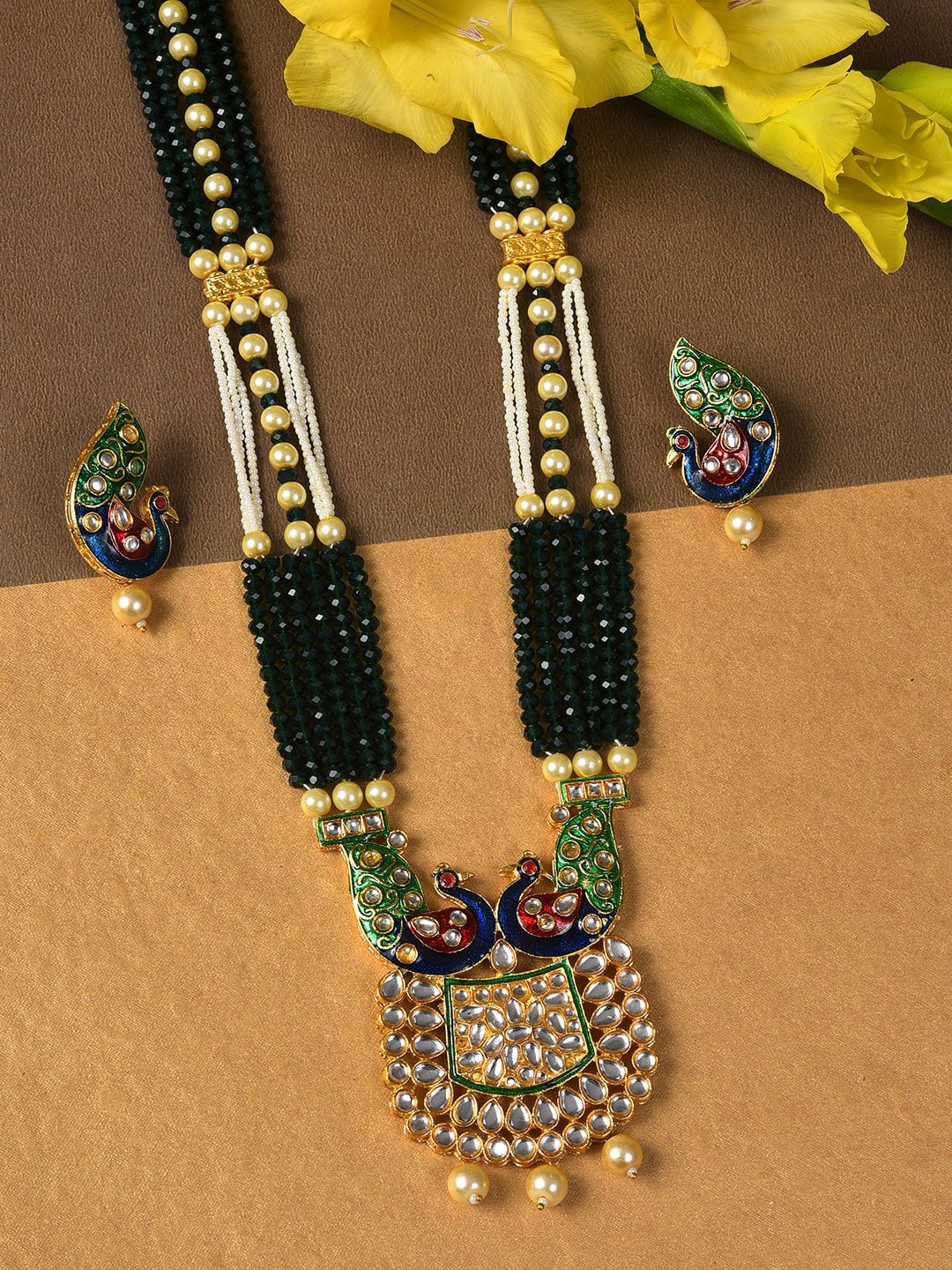 

SOHI Gold-Plated White & Green Stone-Studded & Beaded Jewellery Set