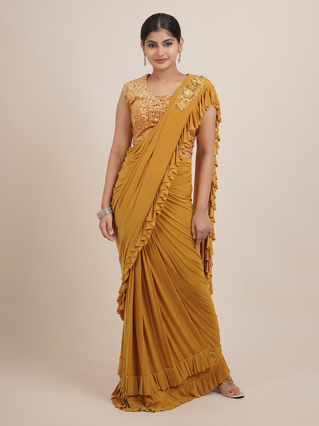 

Pothys Mustard Solid Ruffle Satin Saree