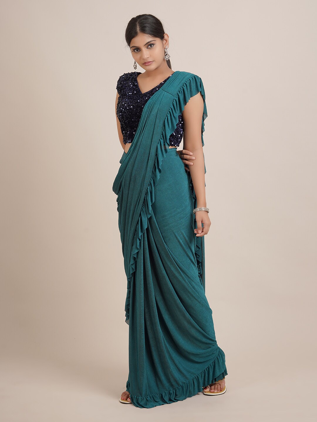

Pothys Green Solid Satin Saree