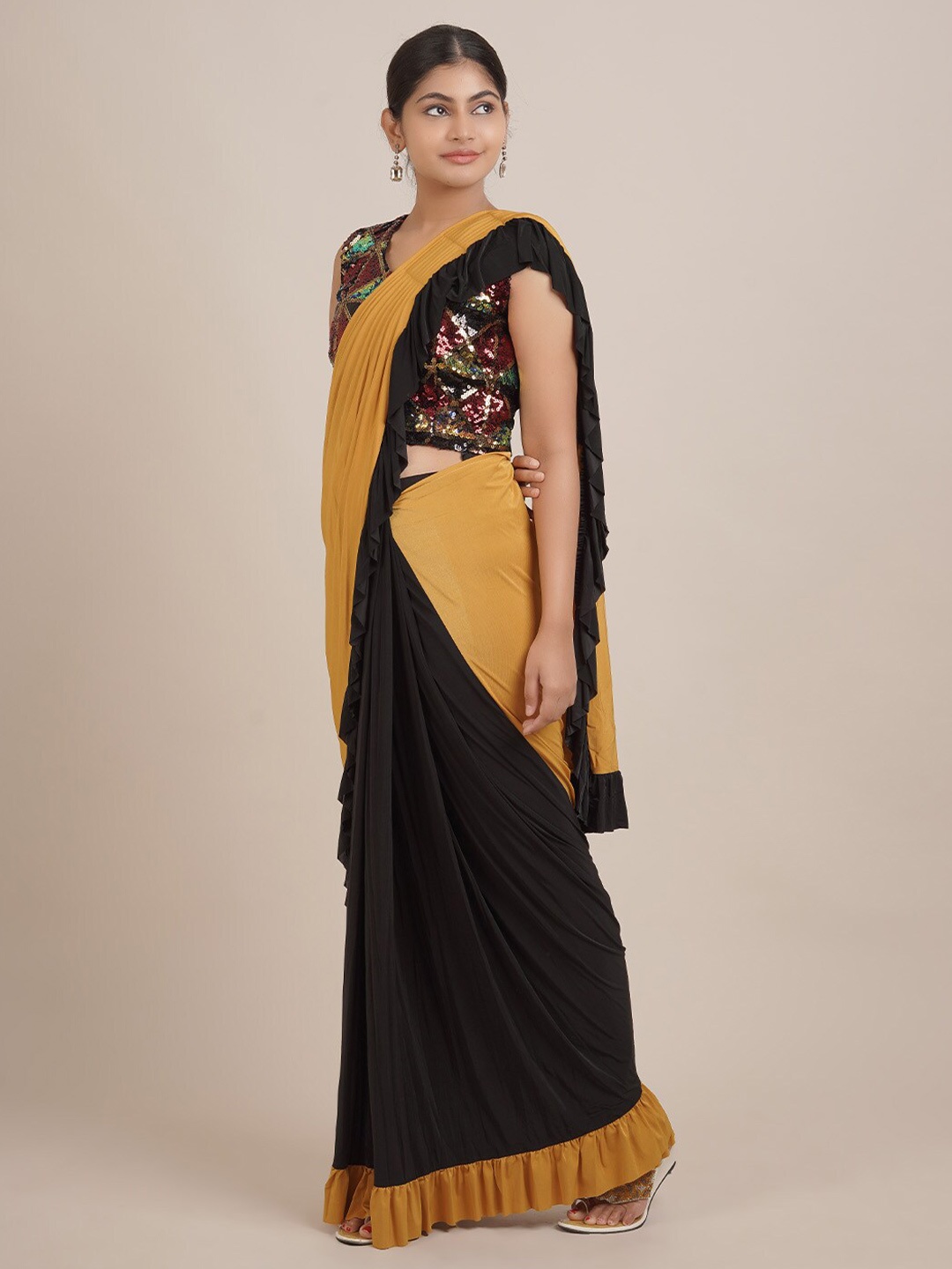 

Pothys Black & Mustard Colourblocked Sequinned Satin Saree