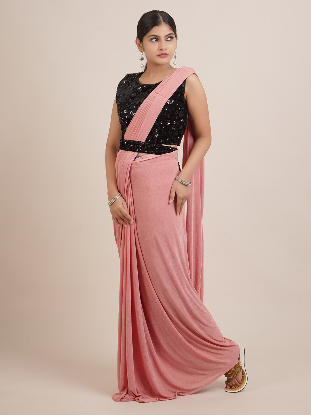

Pothys Pink Solid Sequinned Saree