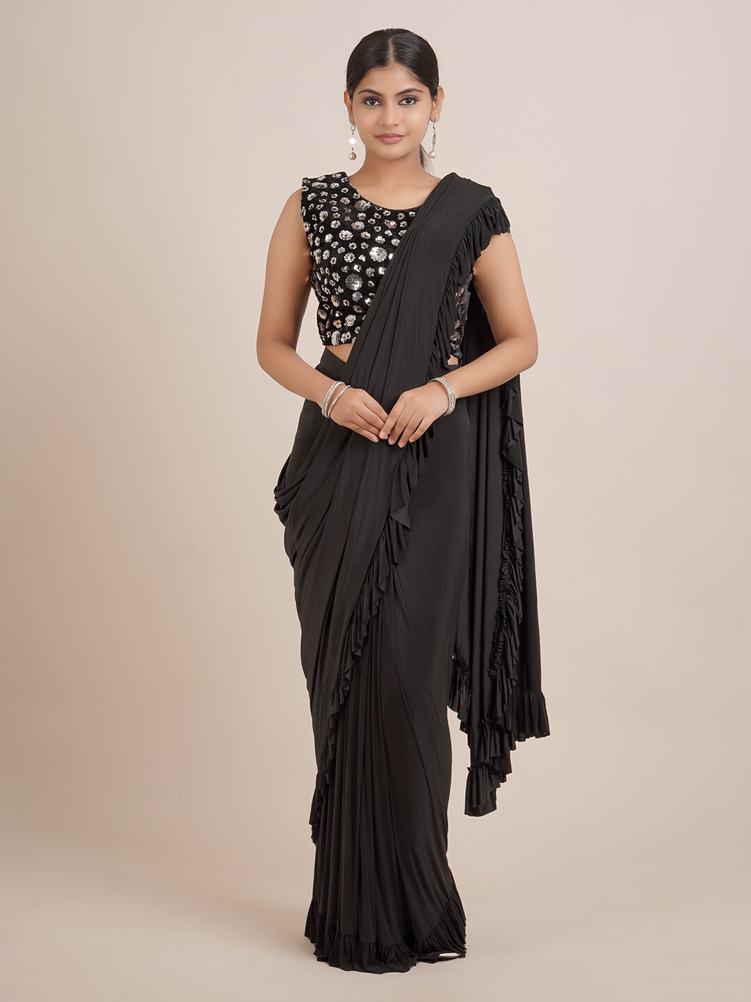 

Pothys Black Solid Satin Saree