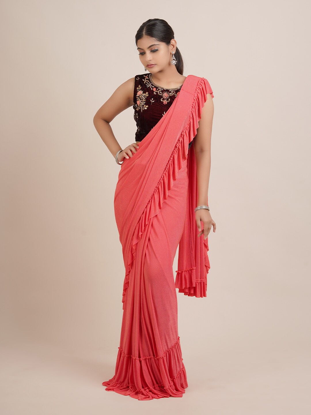 

Pothys Peach-Coloured Embroidered Satin Saree