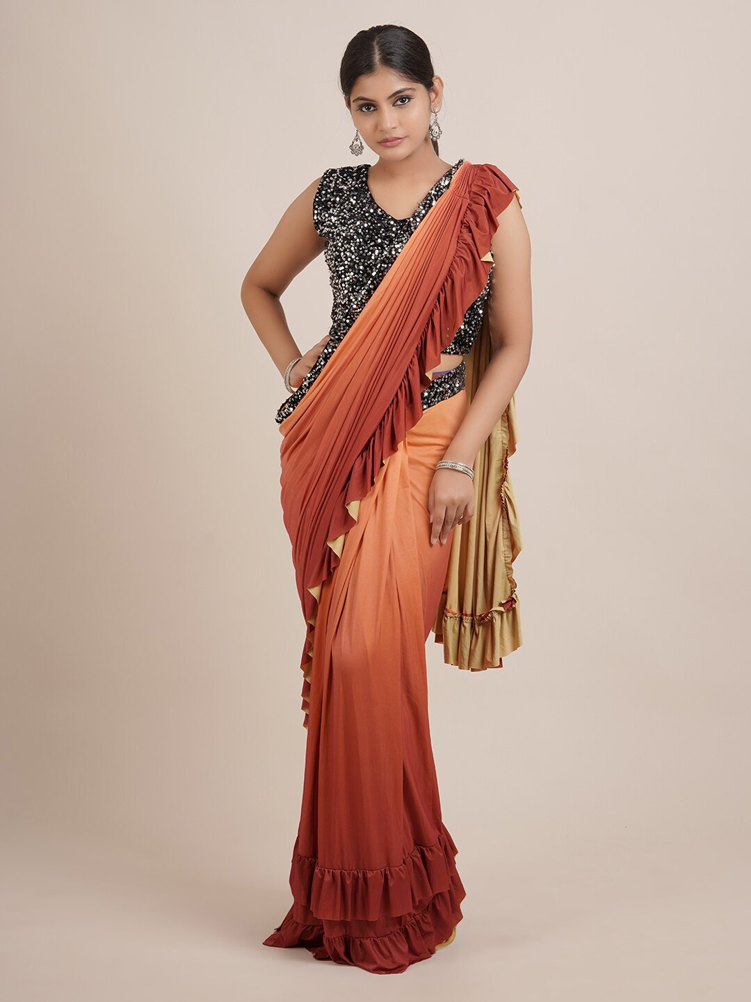 

Pothys Brown & Peach Colourblocked Saree