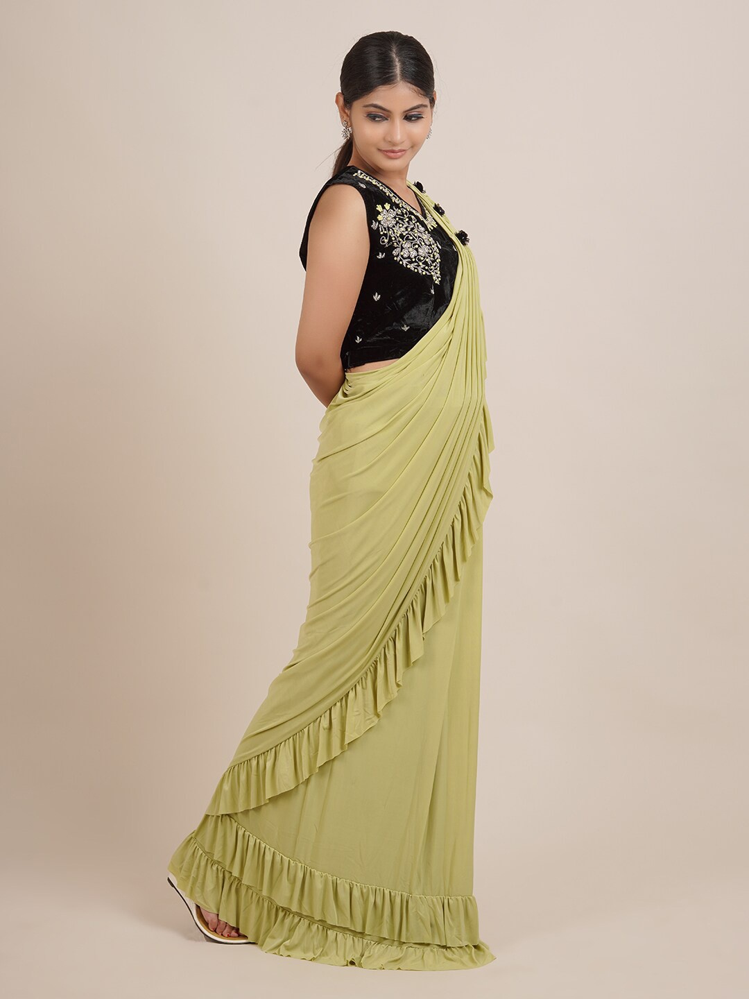 

Pothys Green Solid Satin Saree