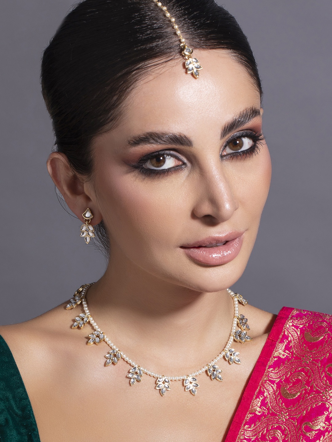 

Rubans Gold-Plated & White AD Studded Jewellery Set