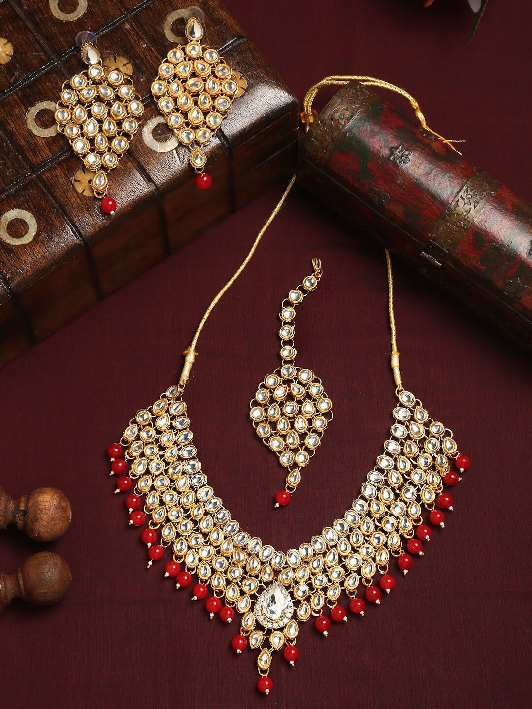 

YouBella Gold-Plated Red Kundan Studded Jewellery Set