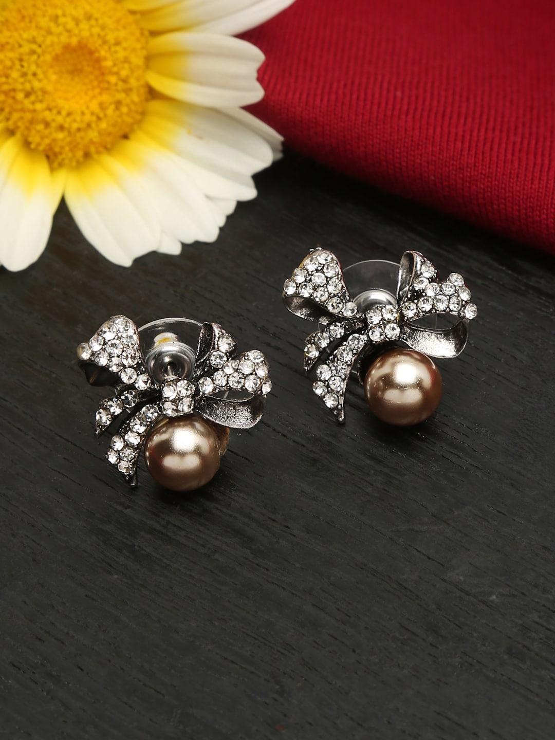 

Celena Cole Silver-Toned Contemporary Studs Earrings