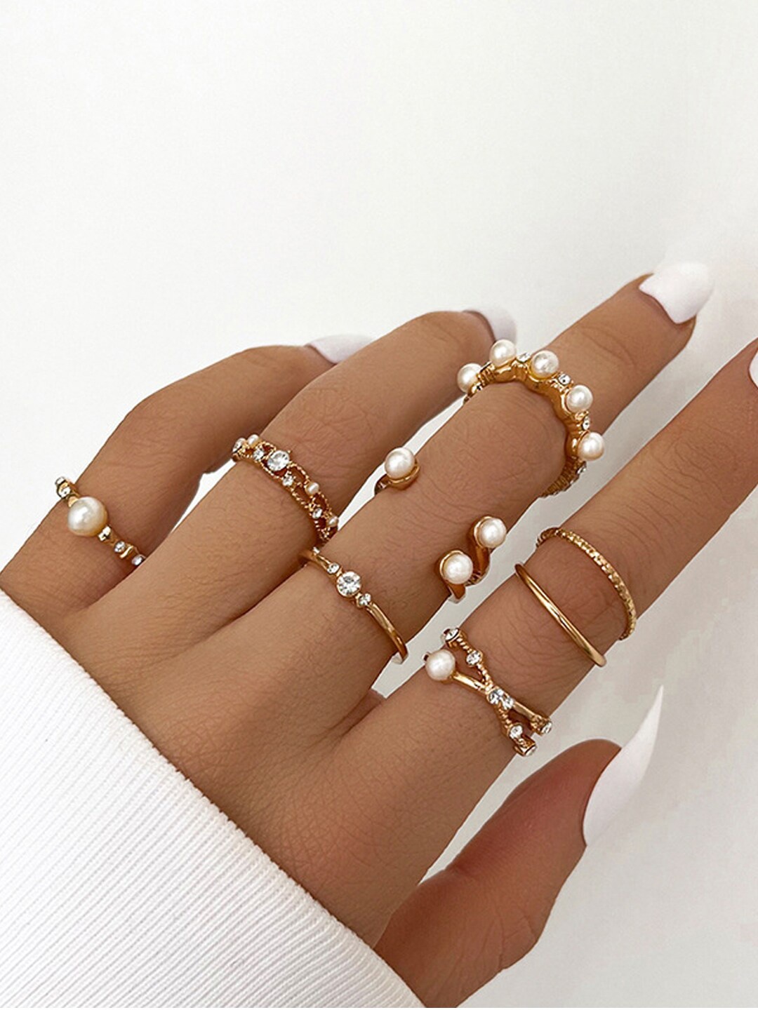 

Shining Diva Fashion Set of 7 Gold-Plated Pearl Studded Finger Rings