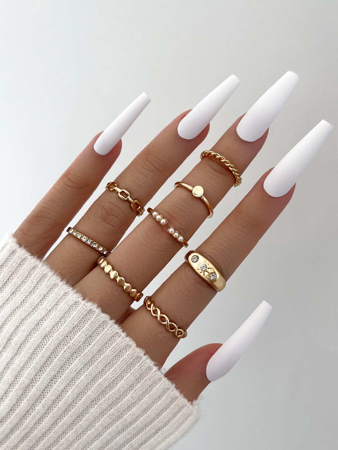 

Shining Diva Fashion Set Of 8 Gold-Plated & White Pearl-Studded Finger Ring