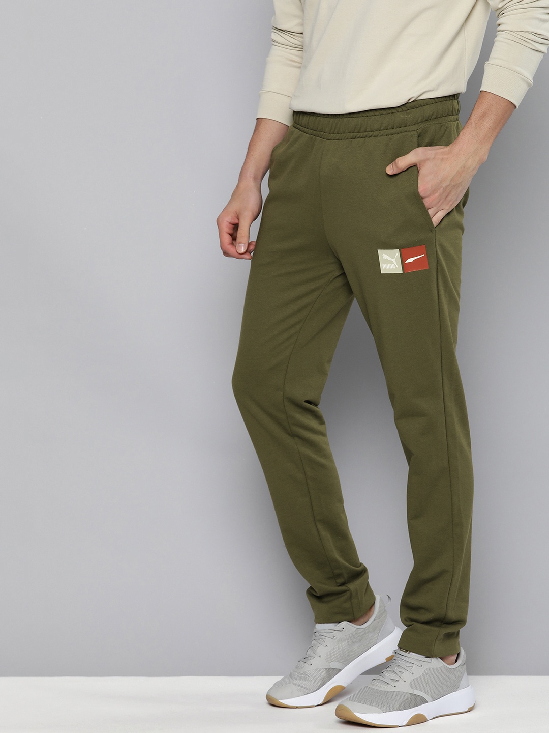 

Puma Men Olive Green Brand Logo Printed Slim Fit Graphic Track Pants
