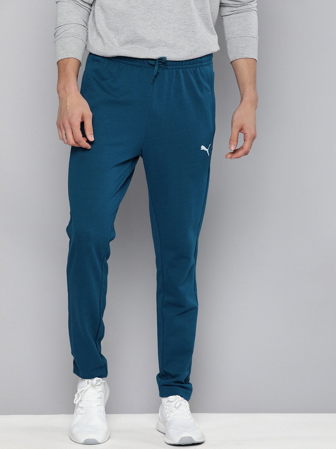 

Puma Men Slim Fit Brand Logo Printed Slim Fit Zippered Track Pants, Blue