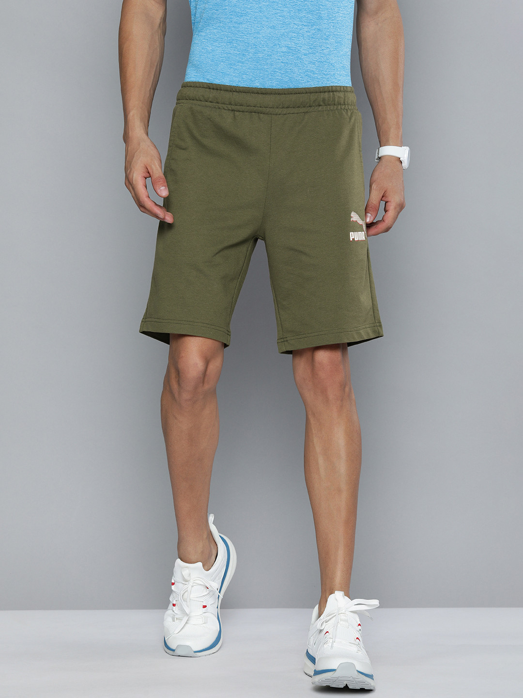 

Puma Men Olive Brand Logo Printed Slim Fit Sports Shorts, Green