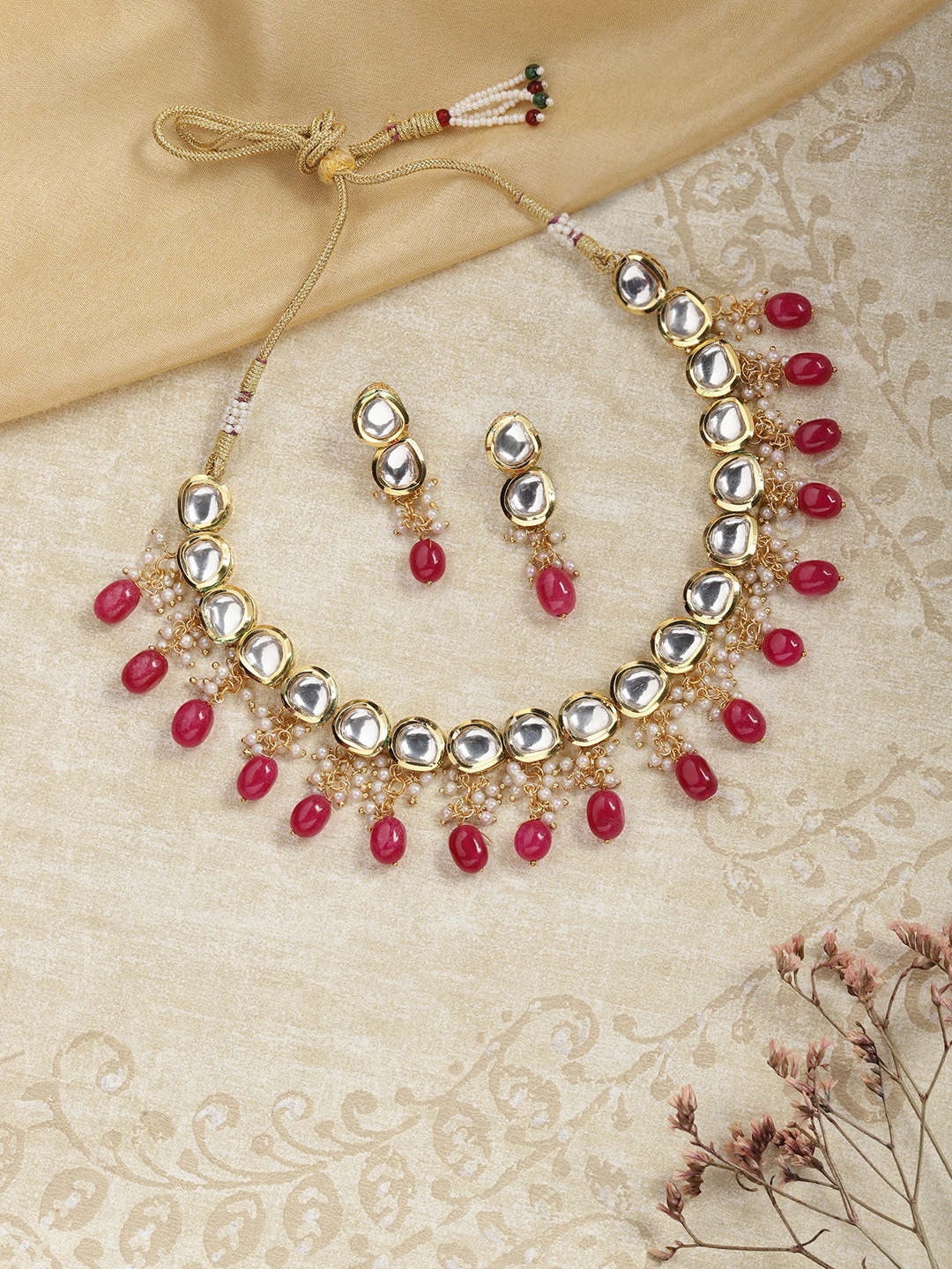 

Melani Borsa Gold Plated Maroon Kundan Ethnic Jewellery Set