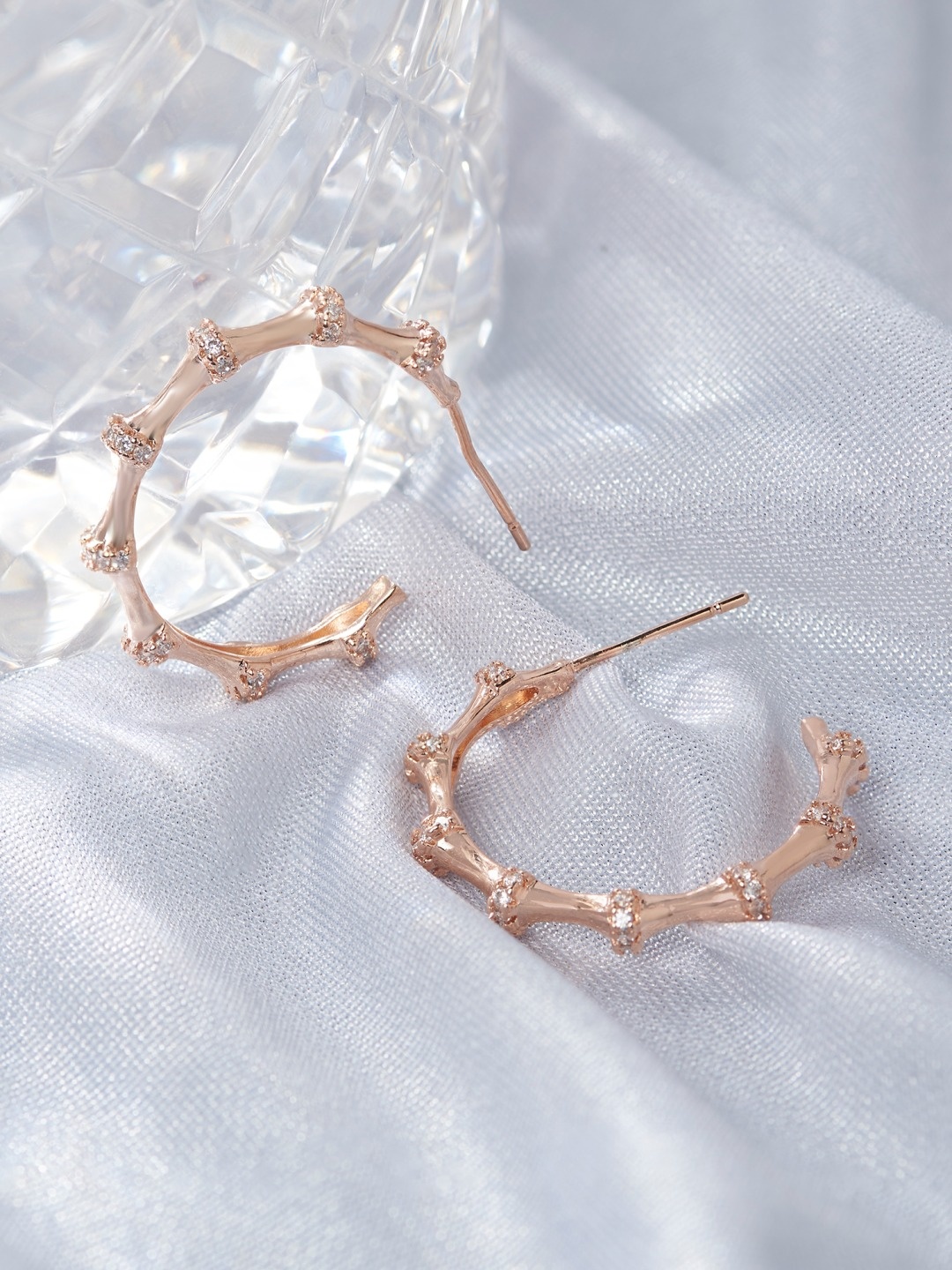 

AMI Rose Gold Plated Cubic Zirconia Studded Half Hoop Earrings