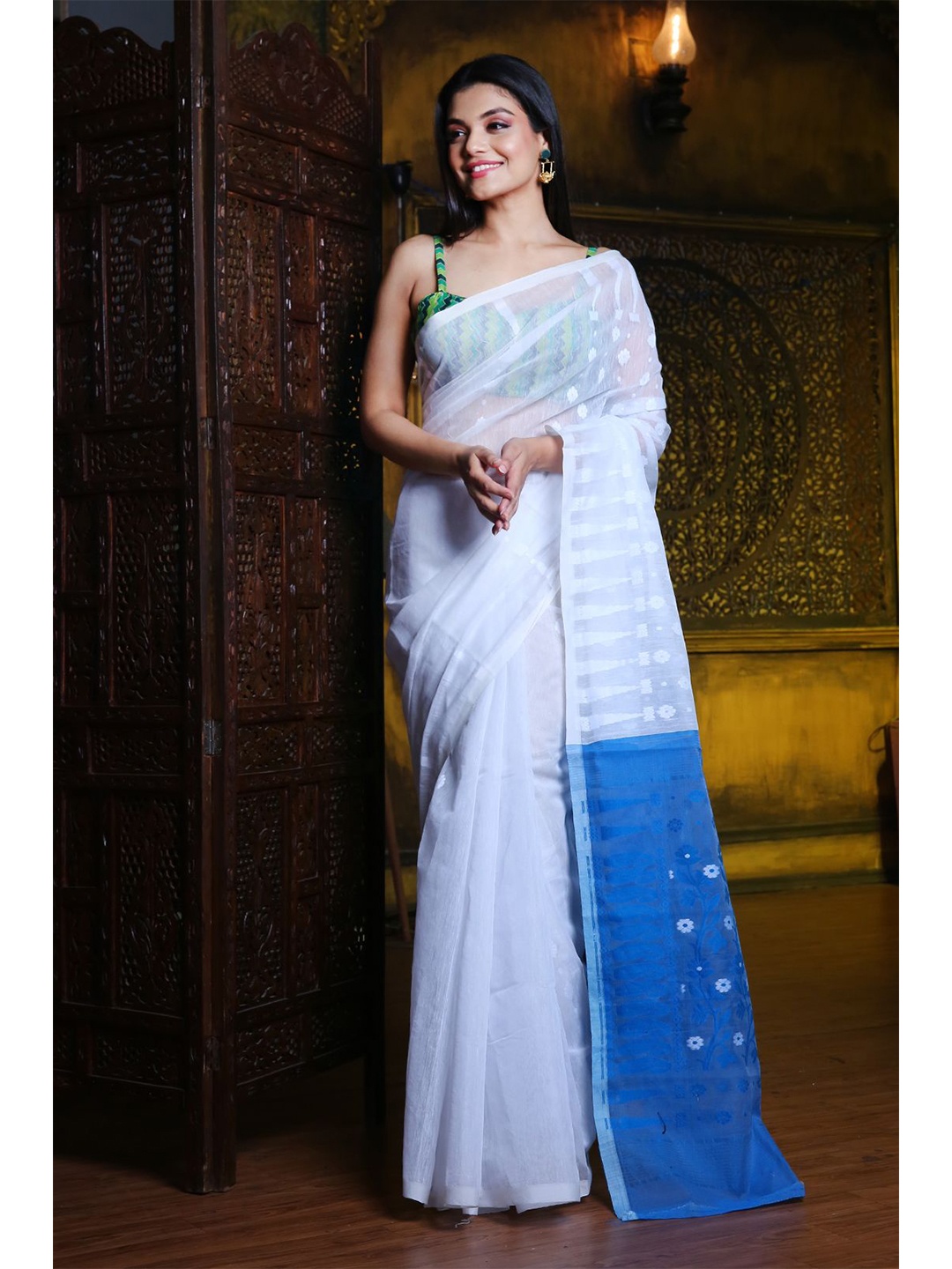 

Charukriti White & Blue Woven Design Jamdani Saree