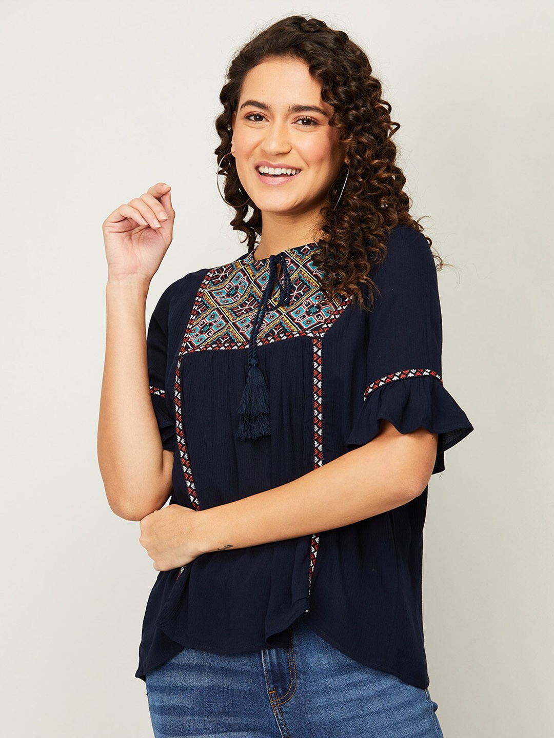 

Fame Forever by Lifestyle Women Navy Blue Embroidered Tie-Up Neck Top