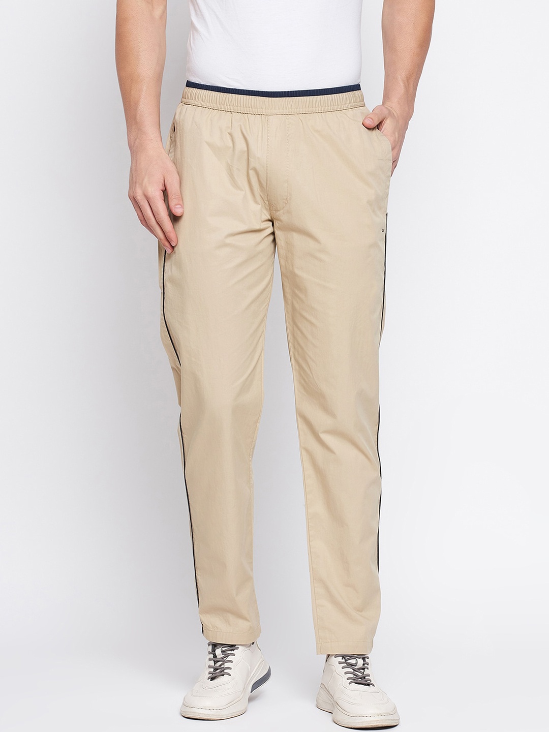 

Okane Men Cream Solid Cotton Track Pants