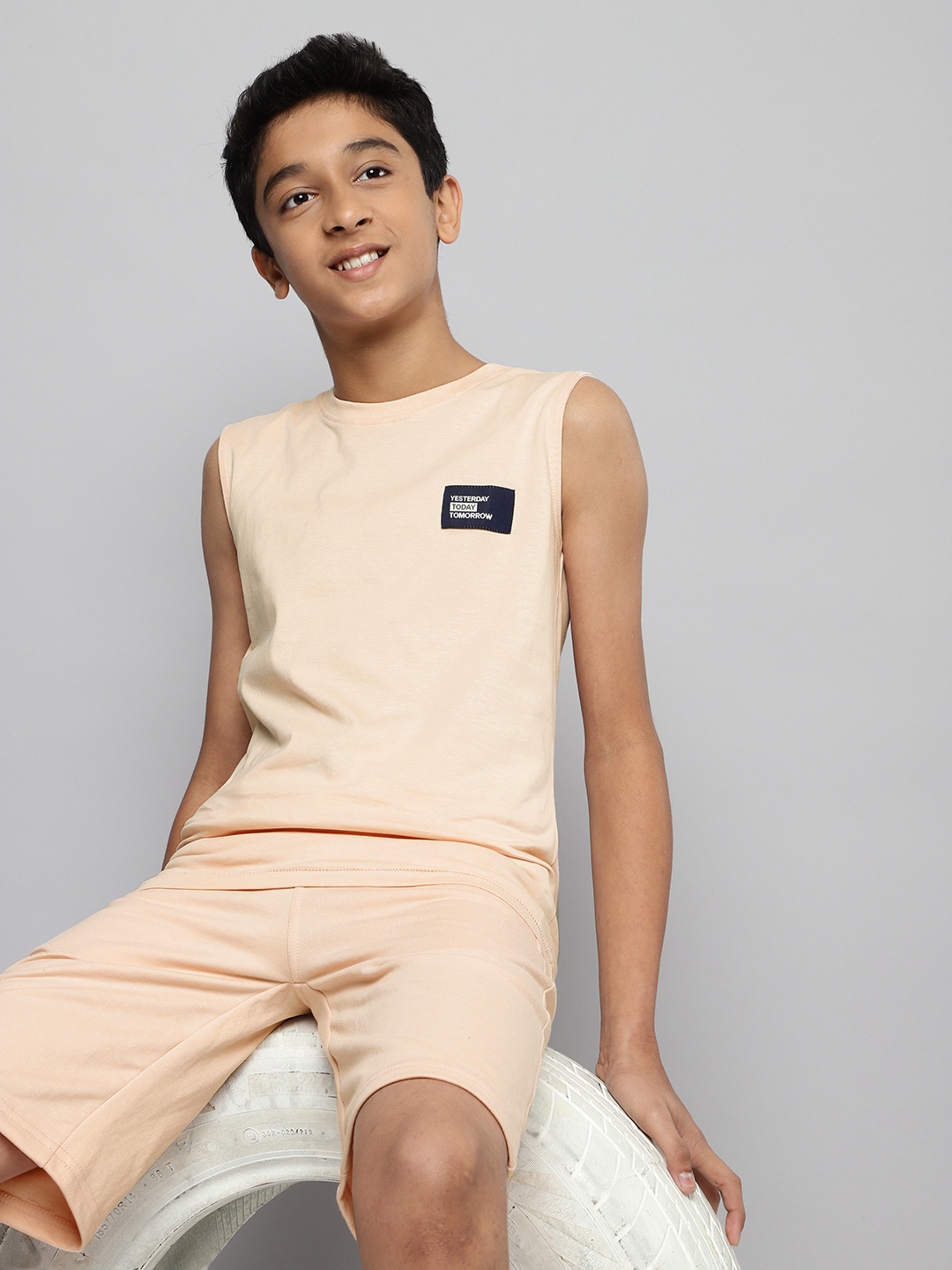

M&H Juniors Boys Peach-Coloured Solid T-shirt with Shorts