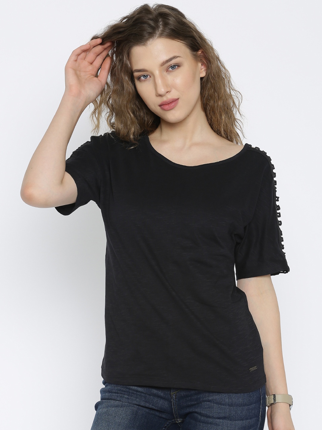 

Flying Machine Women Black Solid T-shirt