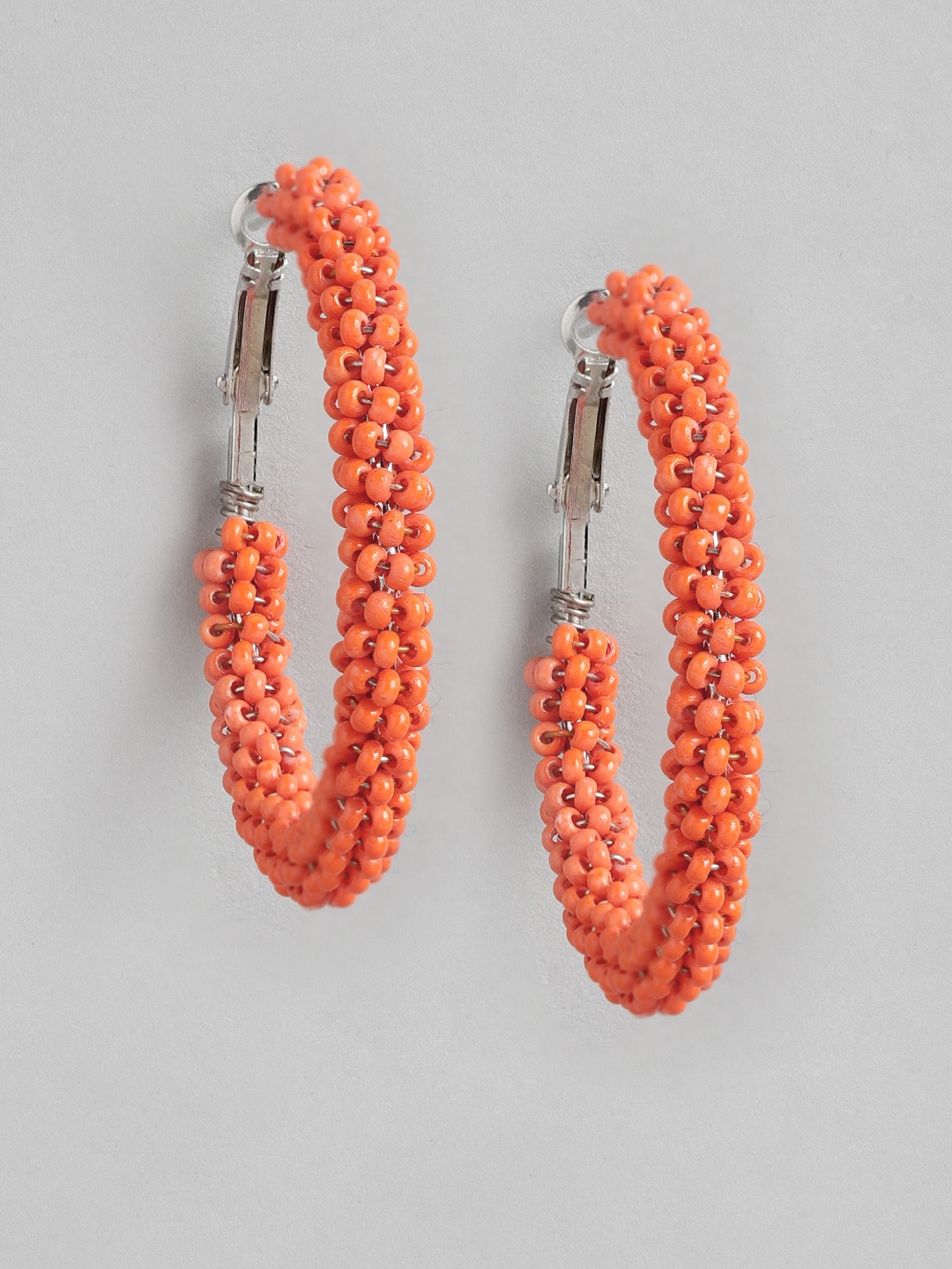 

RICHEERA Orange & Silver-Toned Circular Hoop Earrings