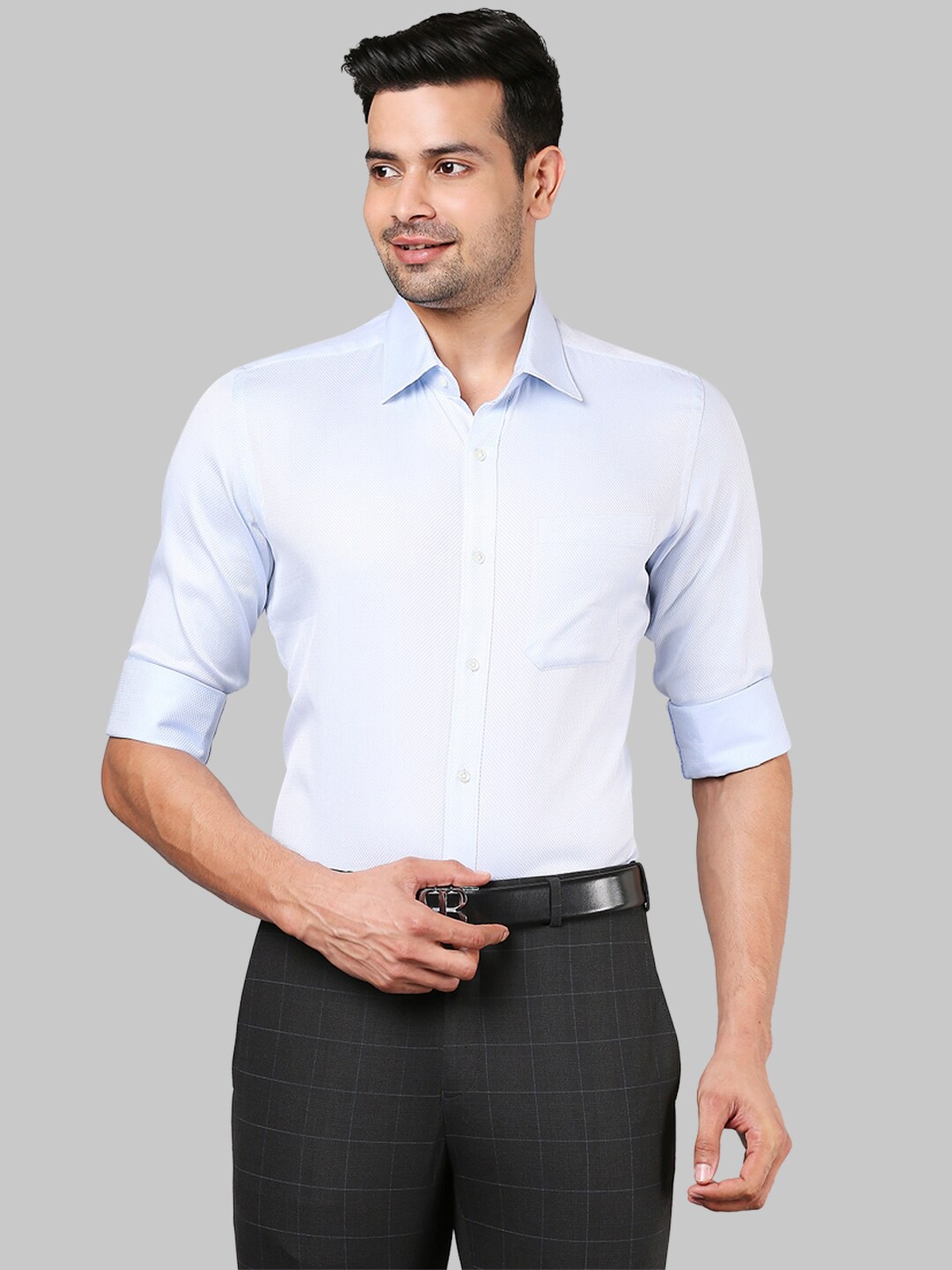 

Raymond Men Blue Textured Formal Shirt