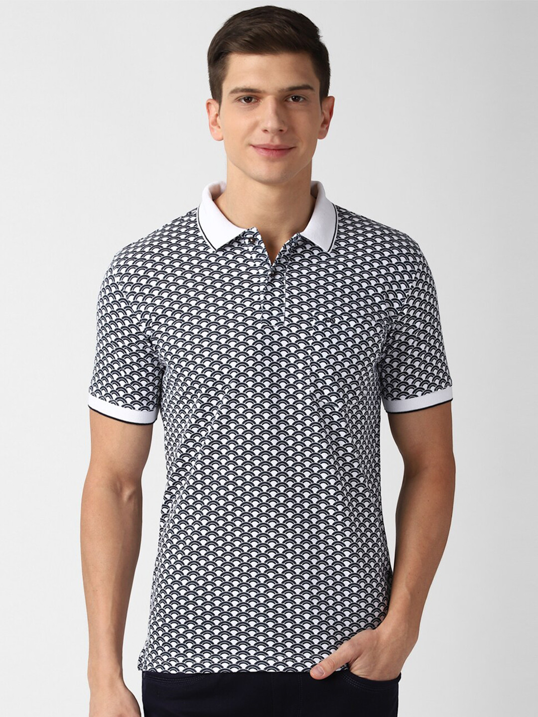 

Peter England Casuals Men White & Black Printed Polo Collar Cotton T-shirt