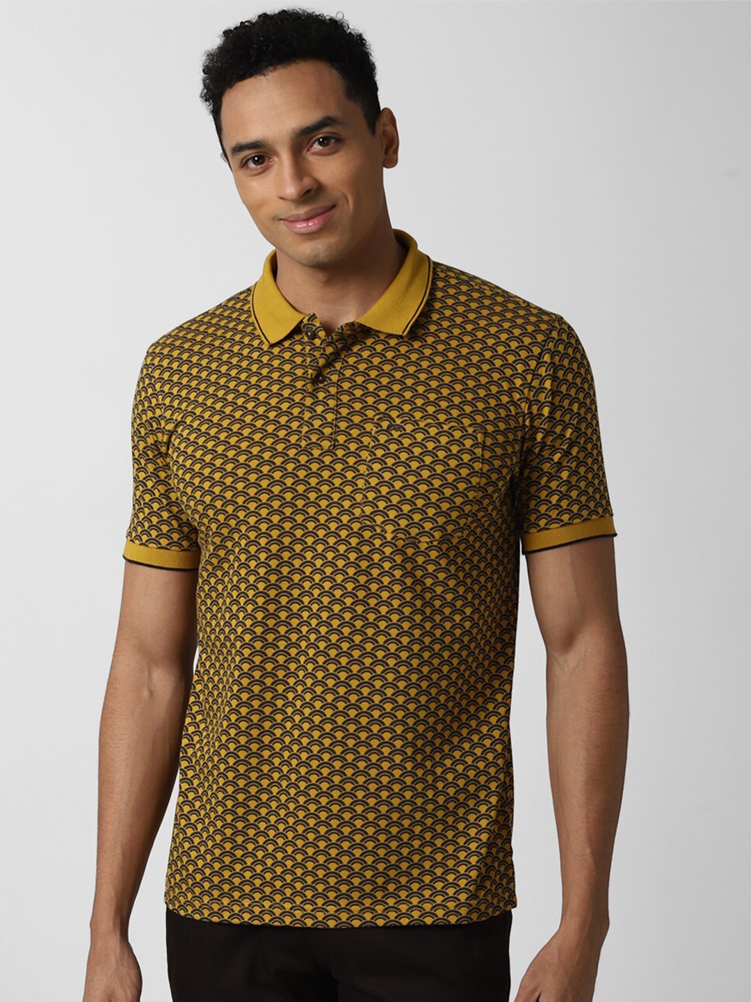 

Peter England Casuals Men Yellow Printed Polo Collar T-shirt