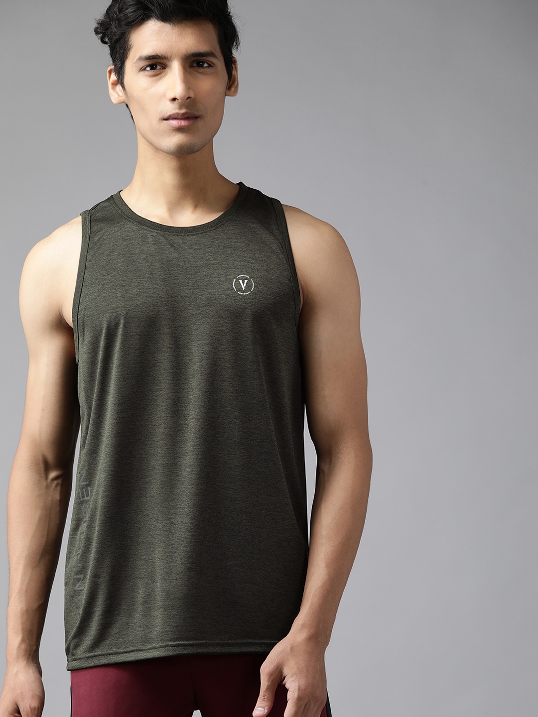 

Van Heusen Flex Men Olive Green Melange Effect Solid Cycling T-shirt