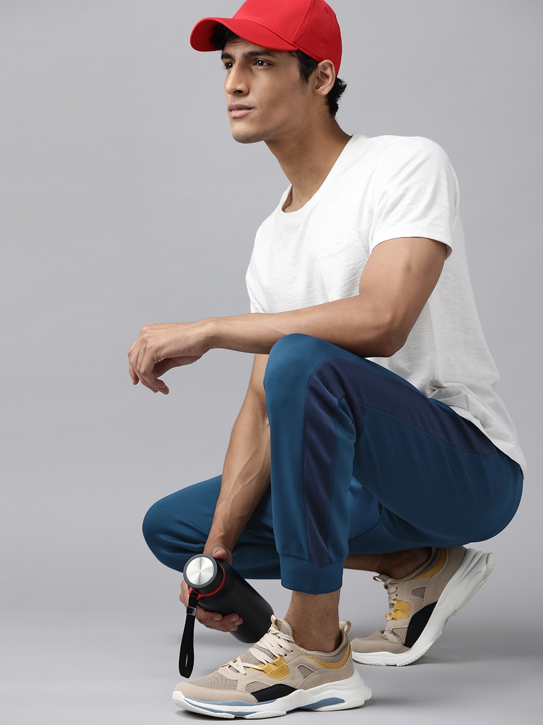 

Van Heusen Flex Men Teal Blue Solid Regular Fit Joggers